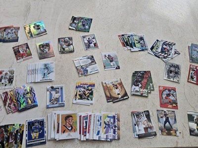 lot of over 700 near mint or mint football cards 100+rc's 100+ inserts 100+ NFL stars prisms parallels