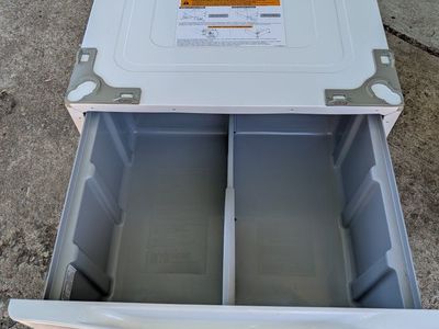 Frontload washer and dryer with pediatals