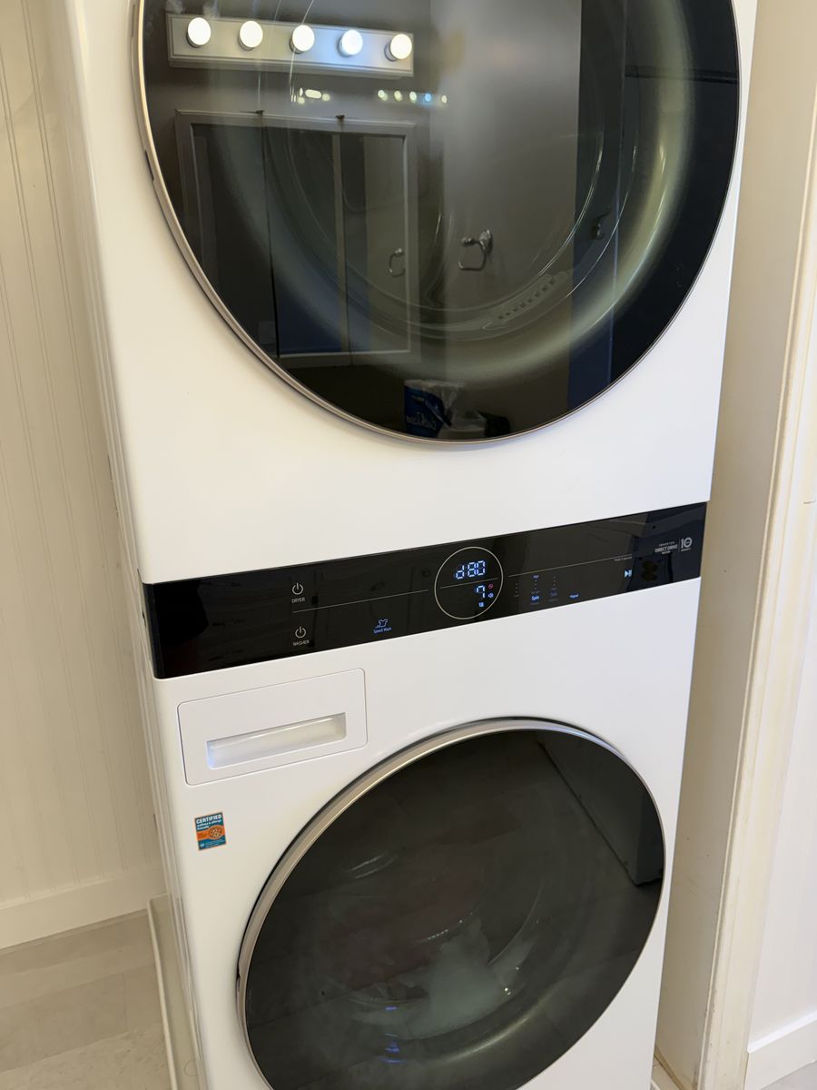 Brand new stackable washer and dryer