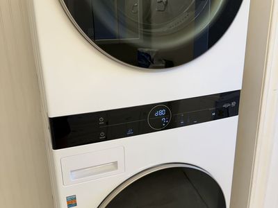 Brand new stackable washer and dryer