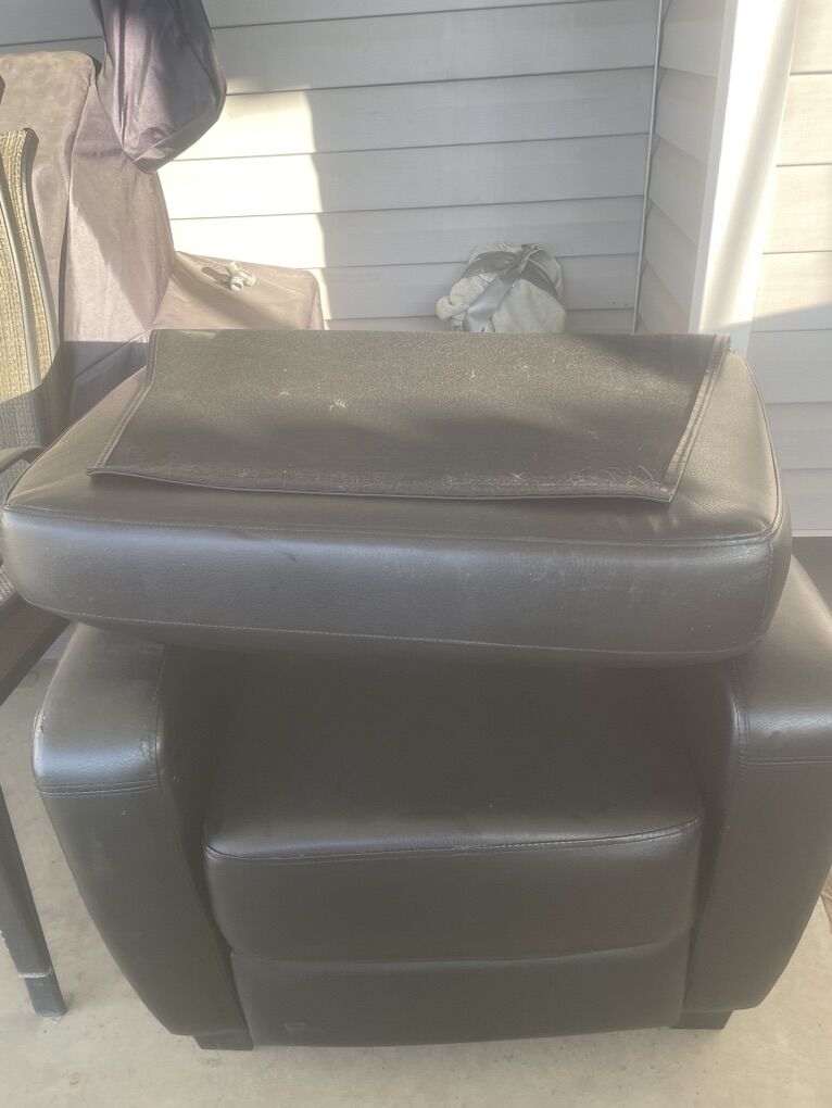 Black chair And Area Rug