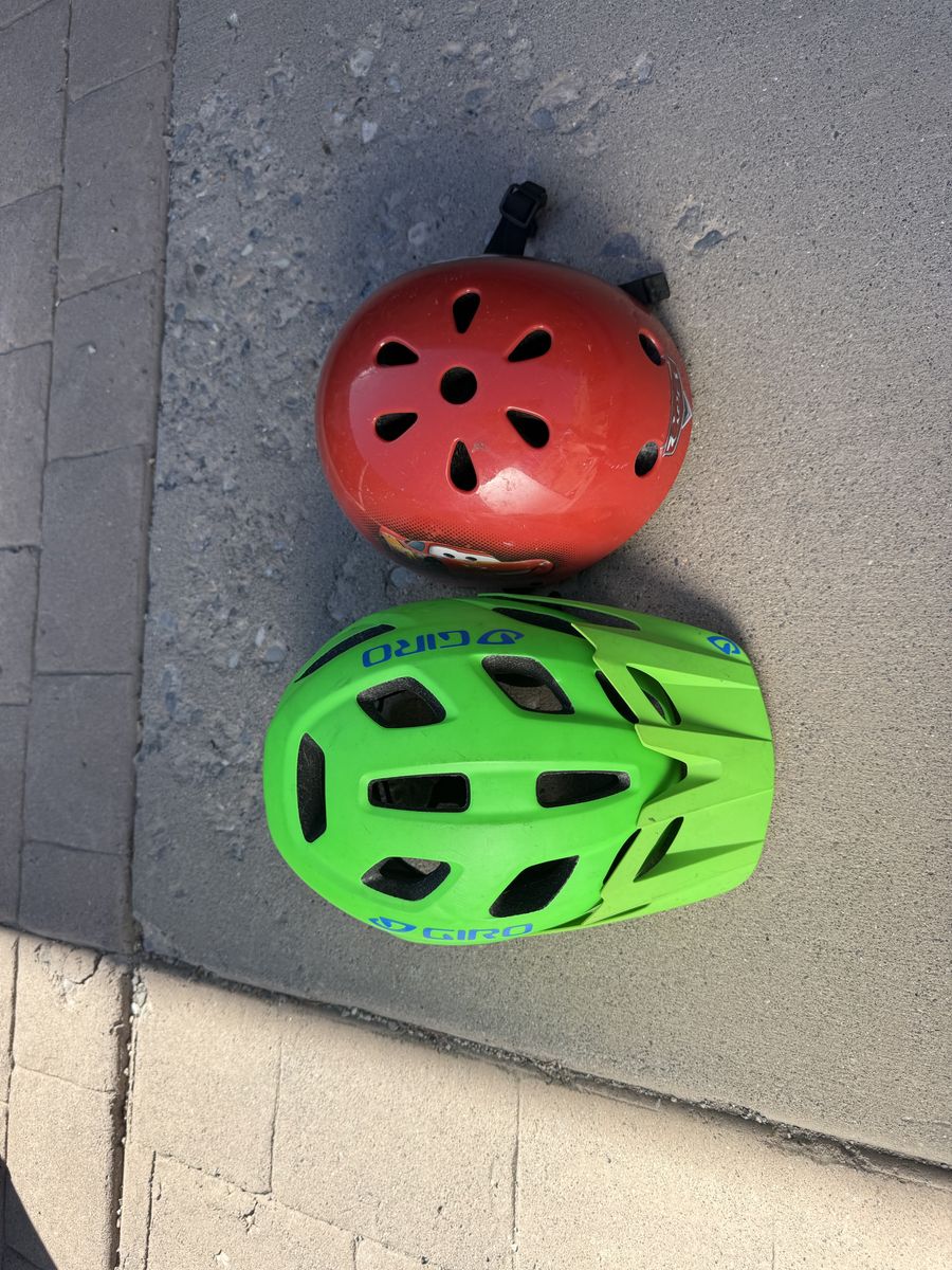 TWO kids bike helmets
