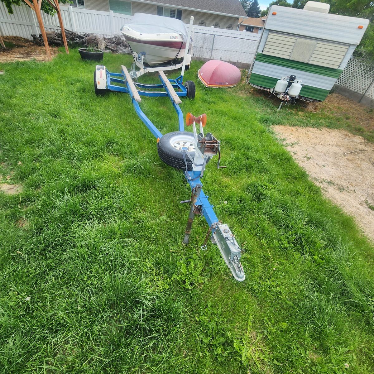 Single axle boat trailer.  New axle and new tires and boat buddies