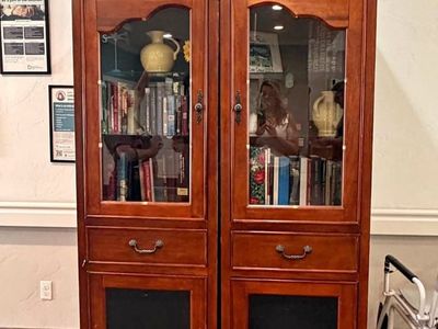 Wooden Display Cabinets with Glass Doors and glass shelves and Storage Drawers seperates to make two tall display cases