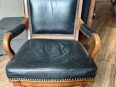 Nice rolling office chair with leather and brass accents