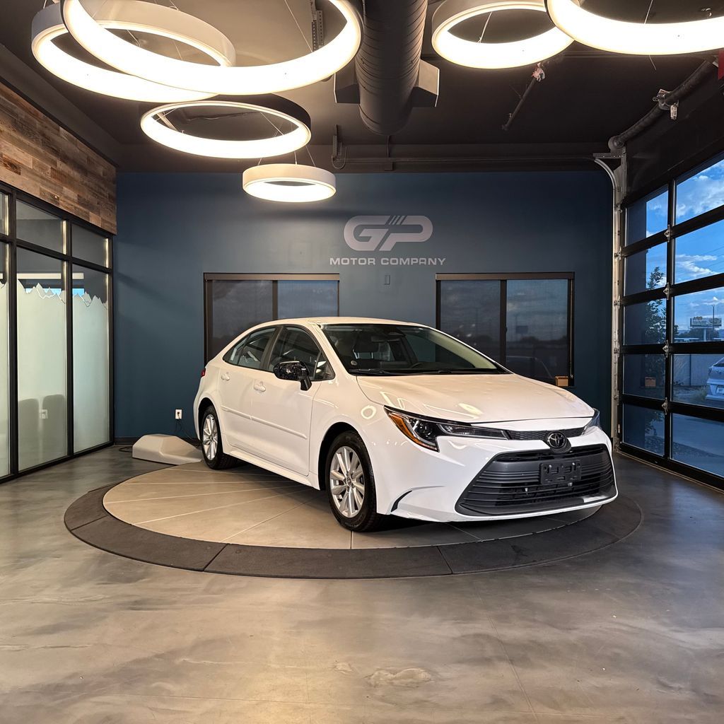 2023 Toyota Corolla LE — rebuilt & branded title, 12% below market