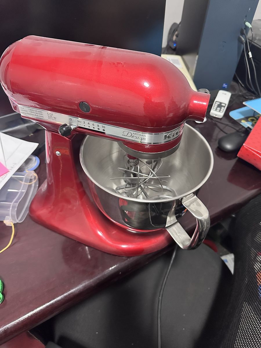 KitchenAid Artisan Design Series Stand Mixer 5-Quart, Empire Red with stainless steel bowl.