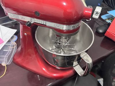 KitchenAid Artisan Design Series Stand Mixer 5-Quart, Empire Red with stainless steel bowl.