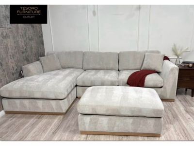 CALEY SECTIONAL AND OTTOMAN WE OFFER DELIVERY