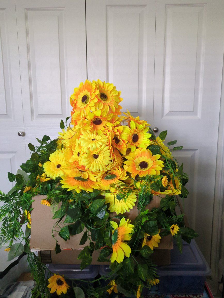 Box of Sun Flower balls and vine decorations