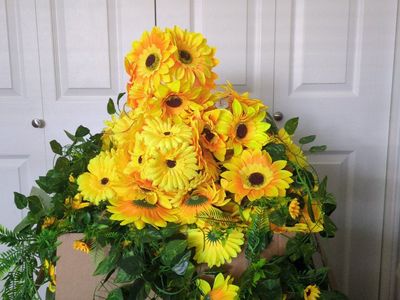 Box of Sun Flower balls and vine decorations
