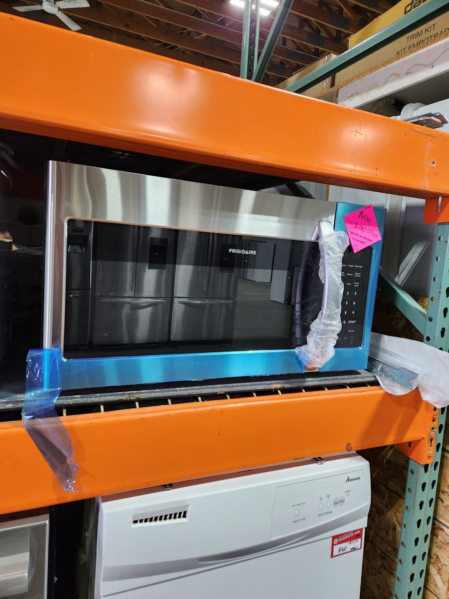 BEAUTIFUL BRAND NEW! FRIGIDAIRE STAINLESS STEEL OVER THE RANGE MICROWAVE!