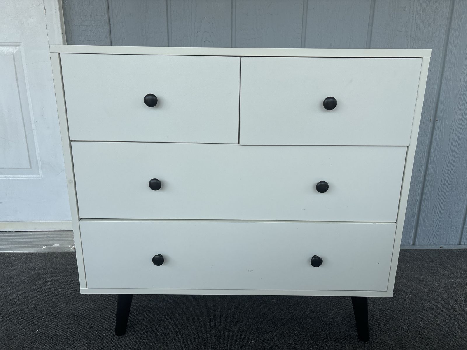 Modern White 4-Drawer Dresser Chest with Black Knobs & Tapered Legs