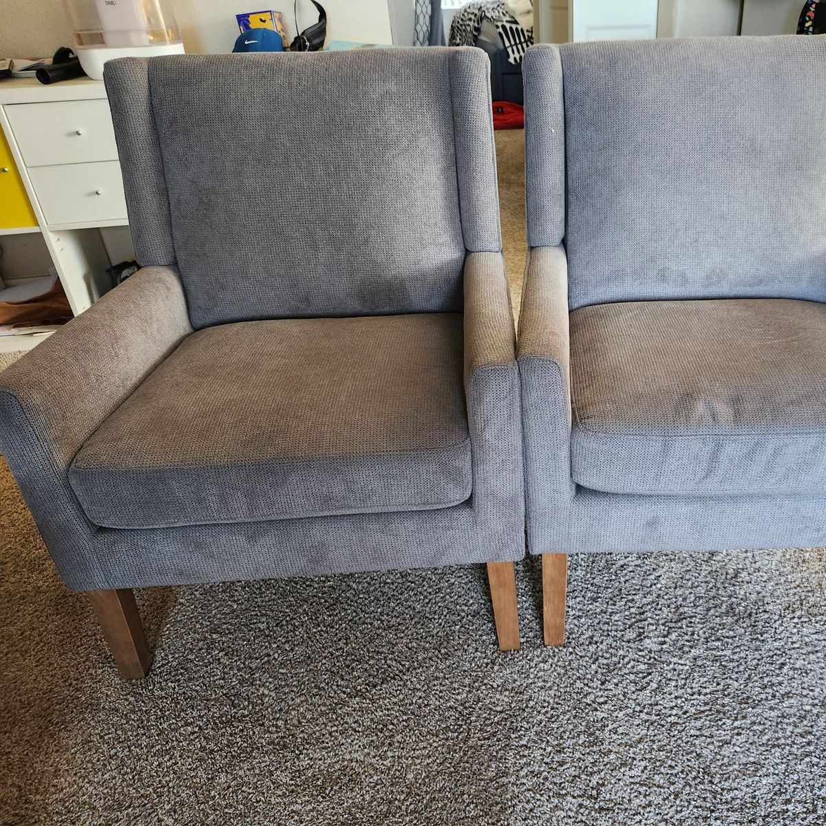 2 Grey single sofas