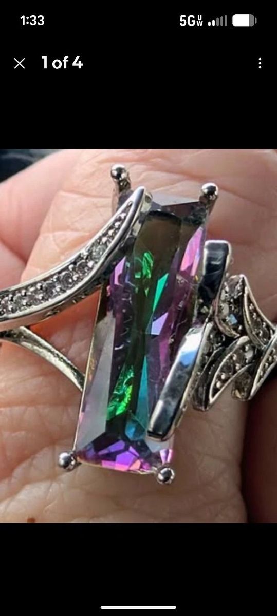 Mystic Topaz ring set in genuine 925 sterling silver. The elongated emerald size 8 located in Roy