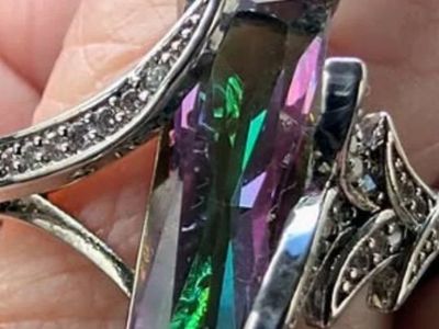 Mystic Topaz ring set in genuine 925 sterling silver. The elongated emerald size 8 located in Roy