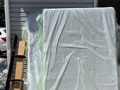 Full size mattress/box springs/metal frame/wood support rails.