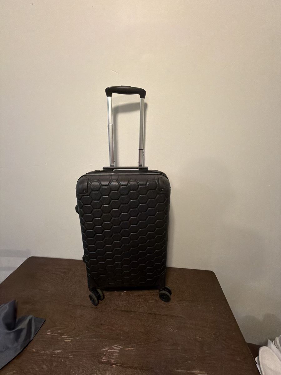 CapriSA hard-shell spinner carry-on/ $40 OBO