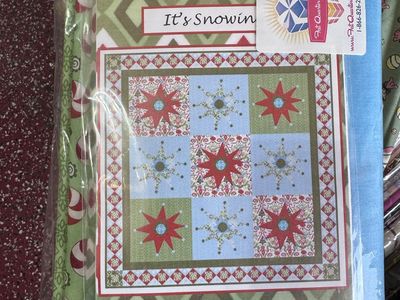 Quilter’s fabric Library of fabric kits, fat quarters, books, embroidery, holiday fabrics galore