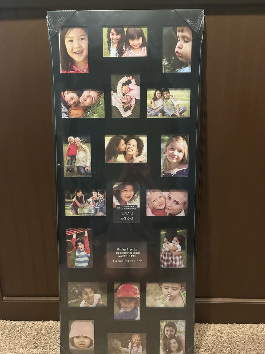New, unused. Studio Décor Black 21-Photo Collage Frame 18.63" x 47" Holds 4"x6" Photos