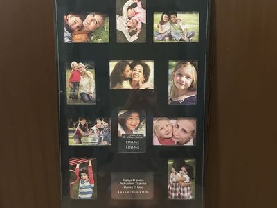 New, unused. Studio Décor Black 21-Photo Collage Frame 18.63" x 47" Holds 4"x6" Photos