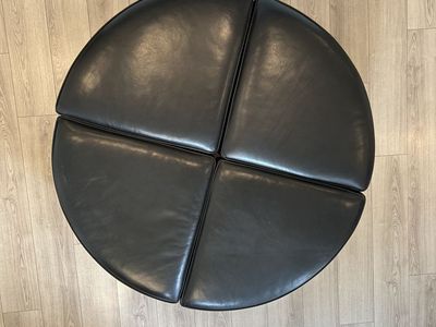 Large Round 4-Piece Modular Leather Ottoman with Nailhead Trim and Wood Legs.