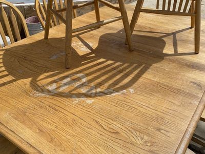 Solid Hardwood Oak table with matching chairs.