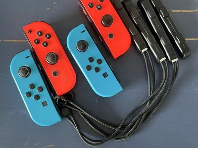 Nintendo Switch Joy-Con Controllers Neon Red & Neon Blue Bundle with Straps