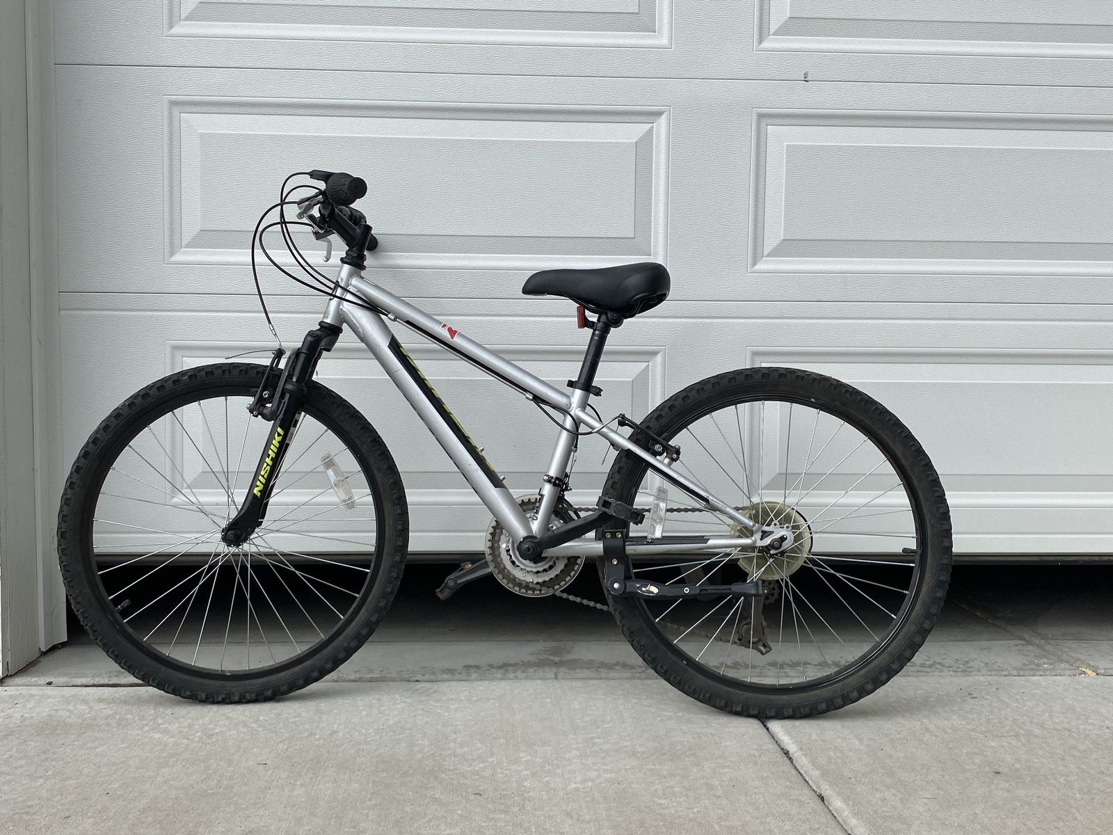 Nishiki Pueblo 24'' Kids Bike with bent back wheel