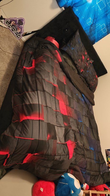 Queen size mattress, and frame with drawers.