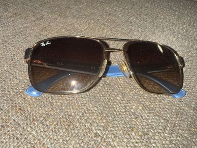 Heaps of sunglasses!! Ray-Ban Aviator Polarized Sunglasses - Gold Frame, Brown Lenses, Blue Tips -