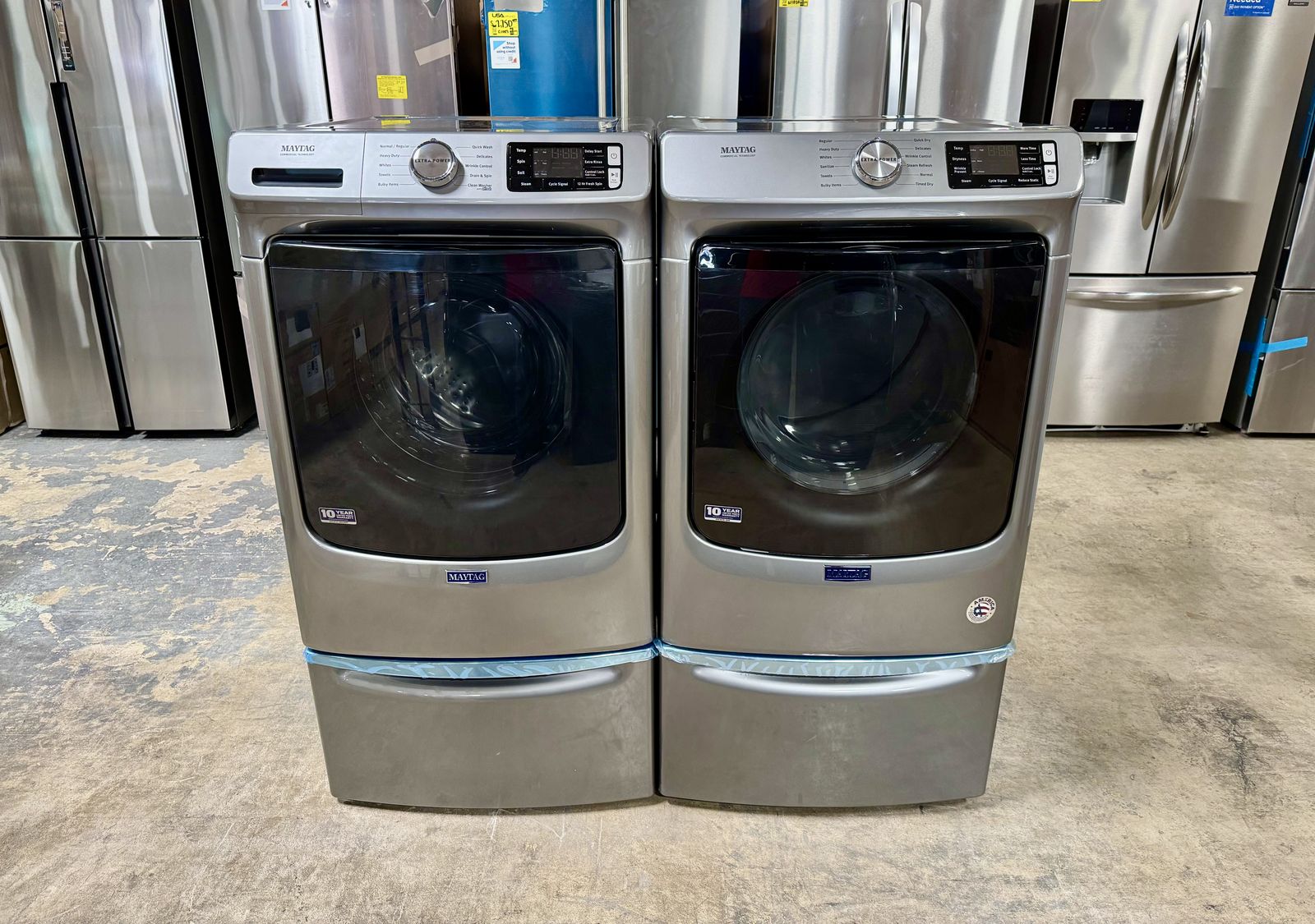 MAYTAG WASHER AND DRYER SET ON PEDESTALS
