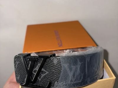 Designer belt wallets glasses and shirts