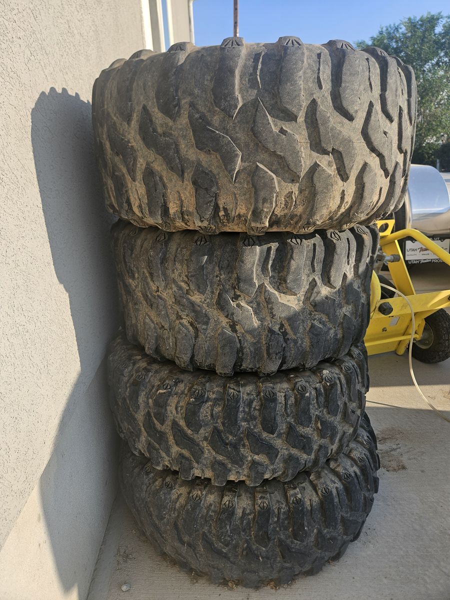 Honda Pioneer 1000 OEM Wheels & QuadBoss Tires – Complete Set of 4