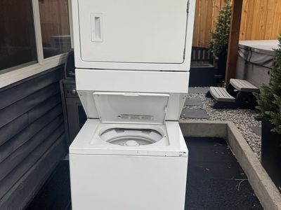 Whirlpool Thin Twin Stacked Laundry Center - Top Load Washer, Electric Dryer, White