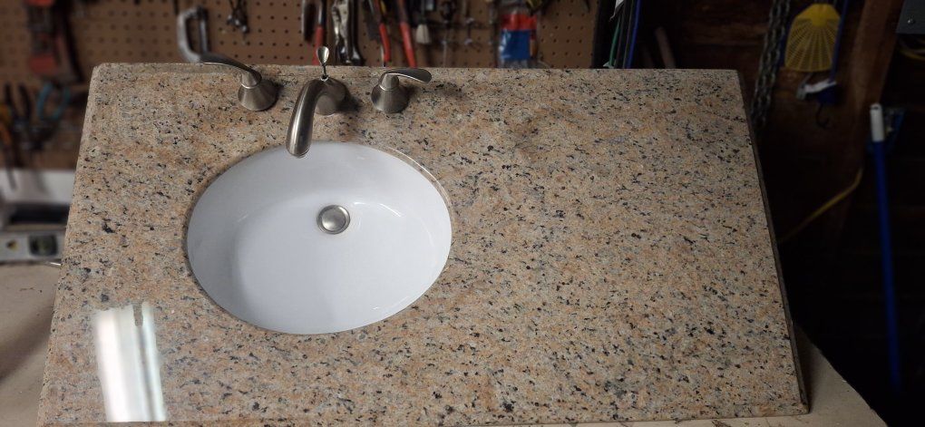 Granite counter top and sink and faucet