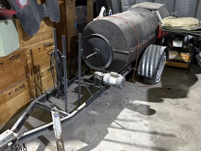 Custom gas rotisserie trailer smoker