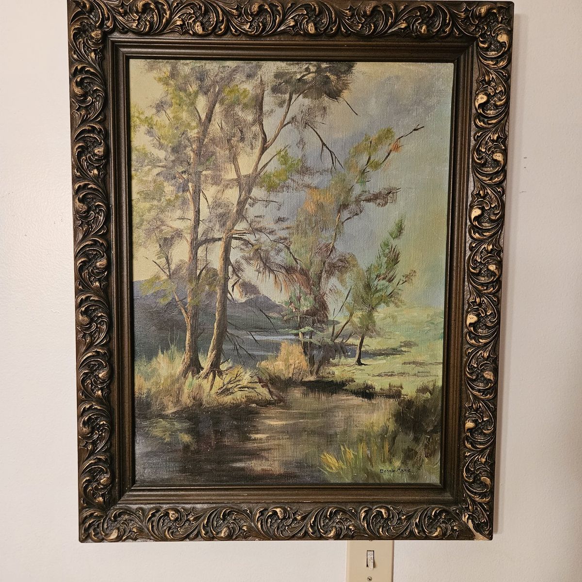 Antique oil painting with decorative wood frame