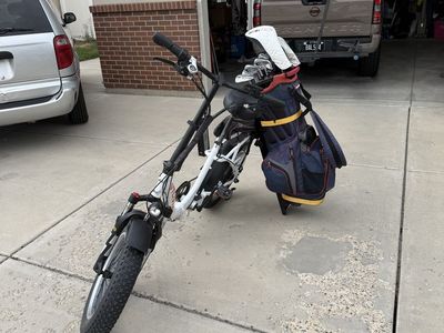 E-bike with golf bag attachment and two bike rack