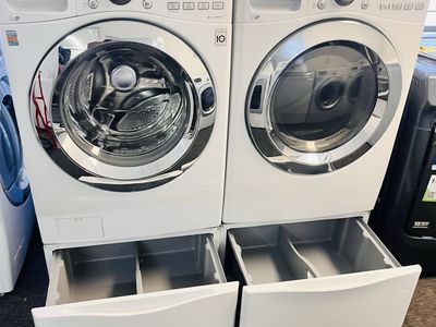 LG washer and dryer set with pedestals