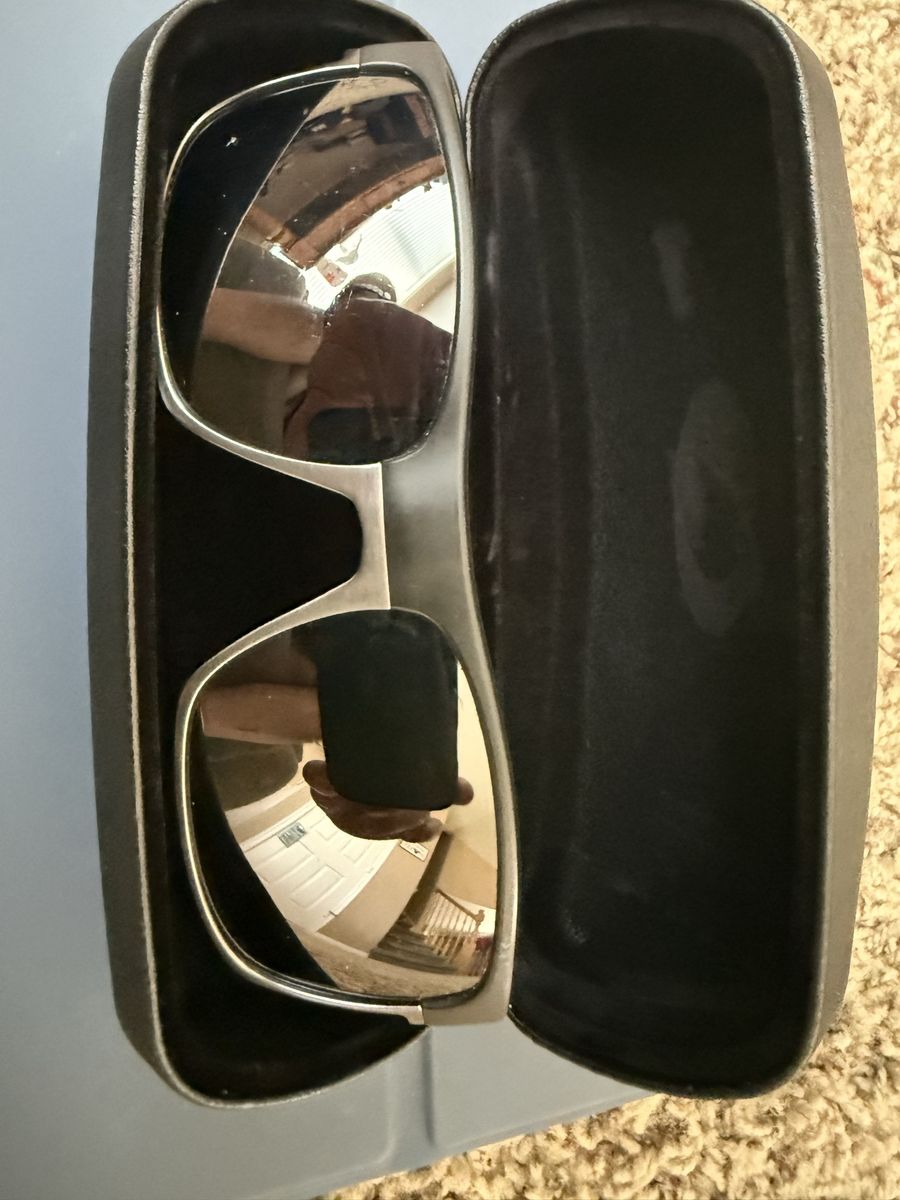 Oakley Two-Face Sunglasses black and gray frames with Prism black polarized lenses with Oakley Hard Case.