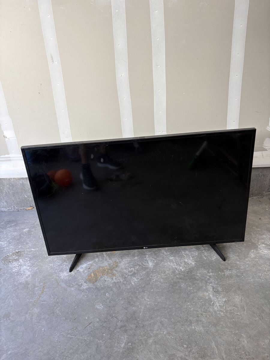 LG Smart LED TV (48 inch) - Black, with Stand