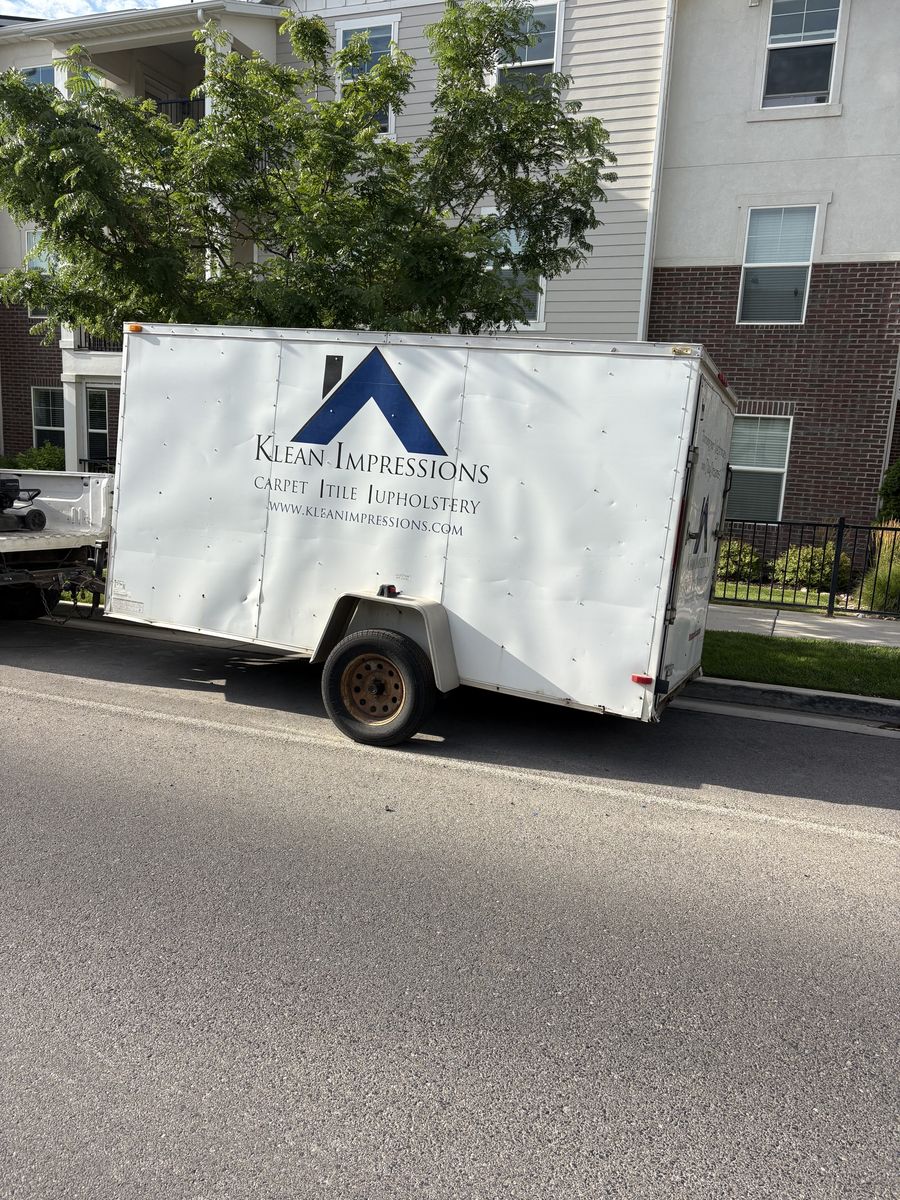 Carpet, cleaning machine and trailer