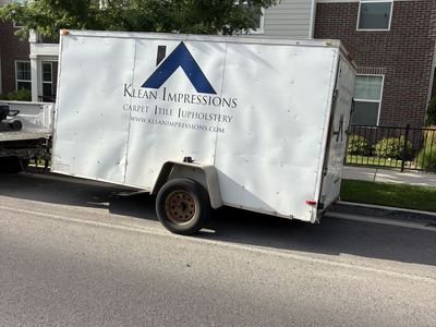 Carpet, cleaning machine and trailer