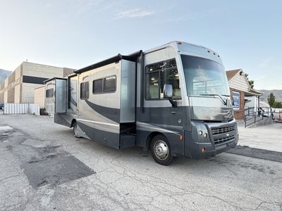 2011 Winnebago Sightseer 33C with 3 Slides