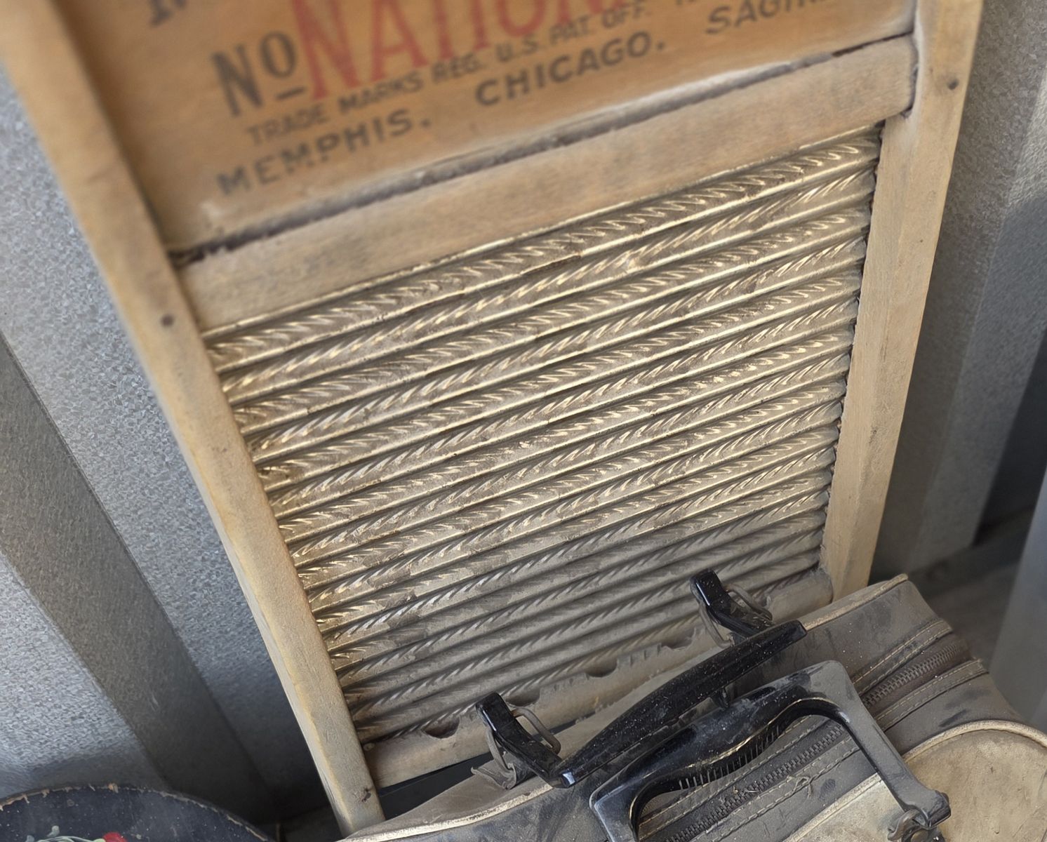 Vintage washboard and separate bowling ball with case