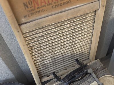 Vintage washboard and separate bowling ball with case