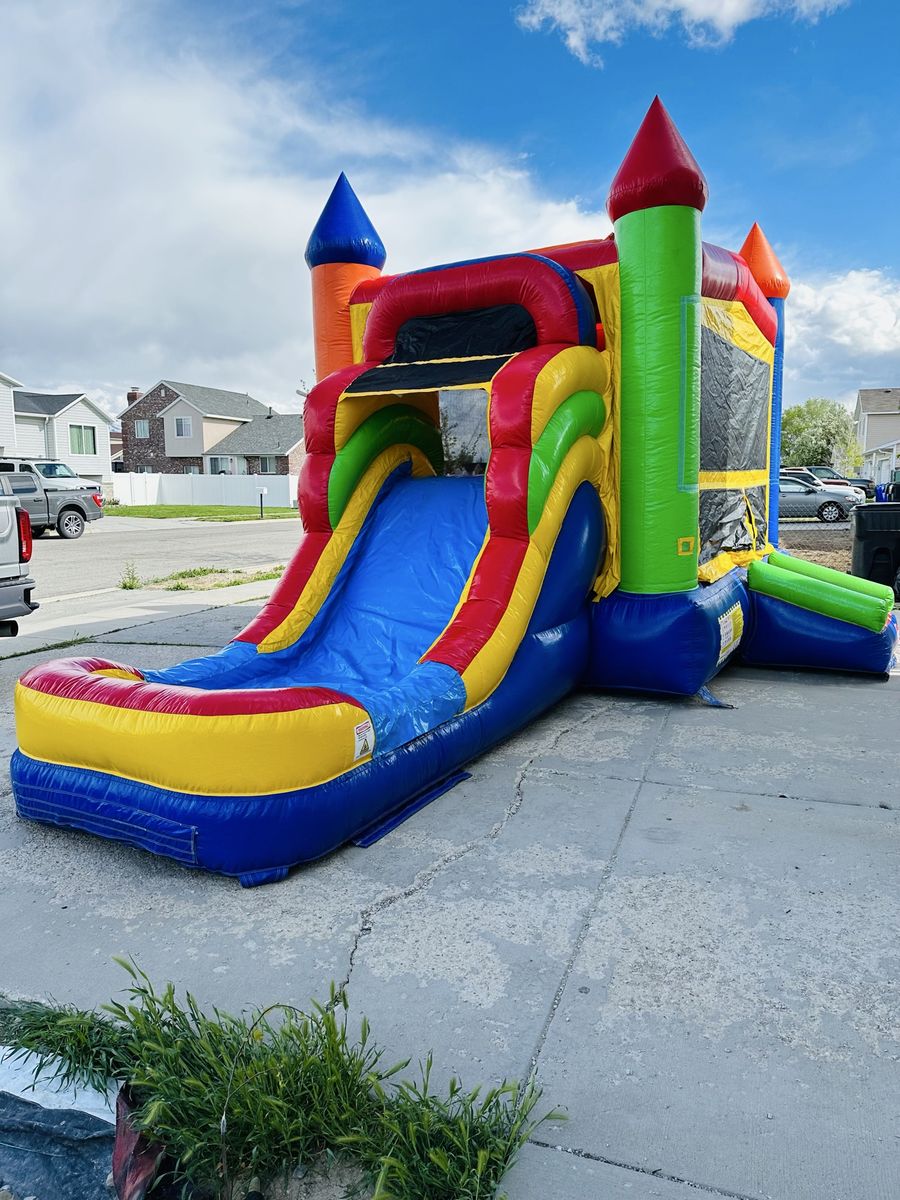 Bounce house with slide
