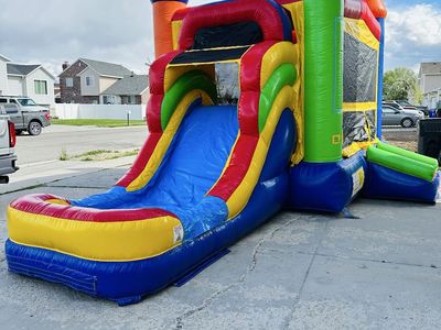 Bounce house with slide