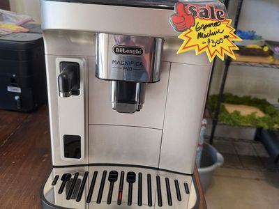 DeLonghi Magnifica Evo Espresso Machine with Supplies